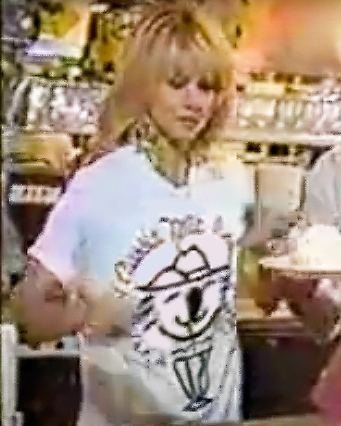 Olivia Newton-John Wearing Original Graphic T-Shirt with Koala Blue Aussie Milk Bar Logo from her 1980’s Clothing Brand