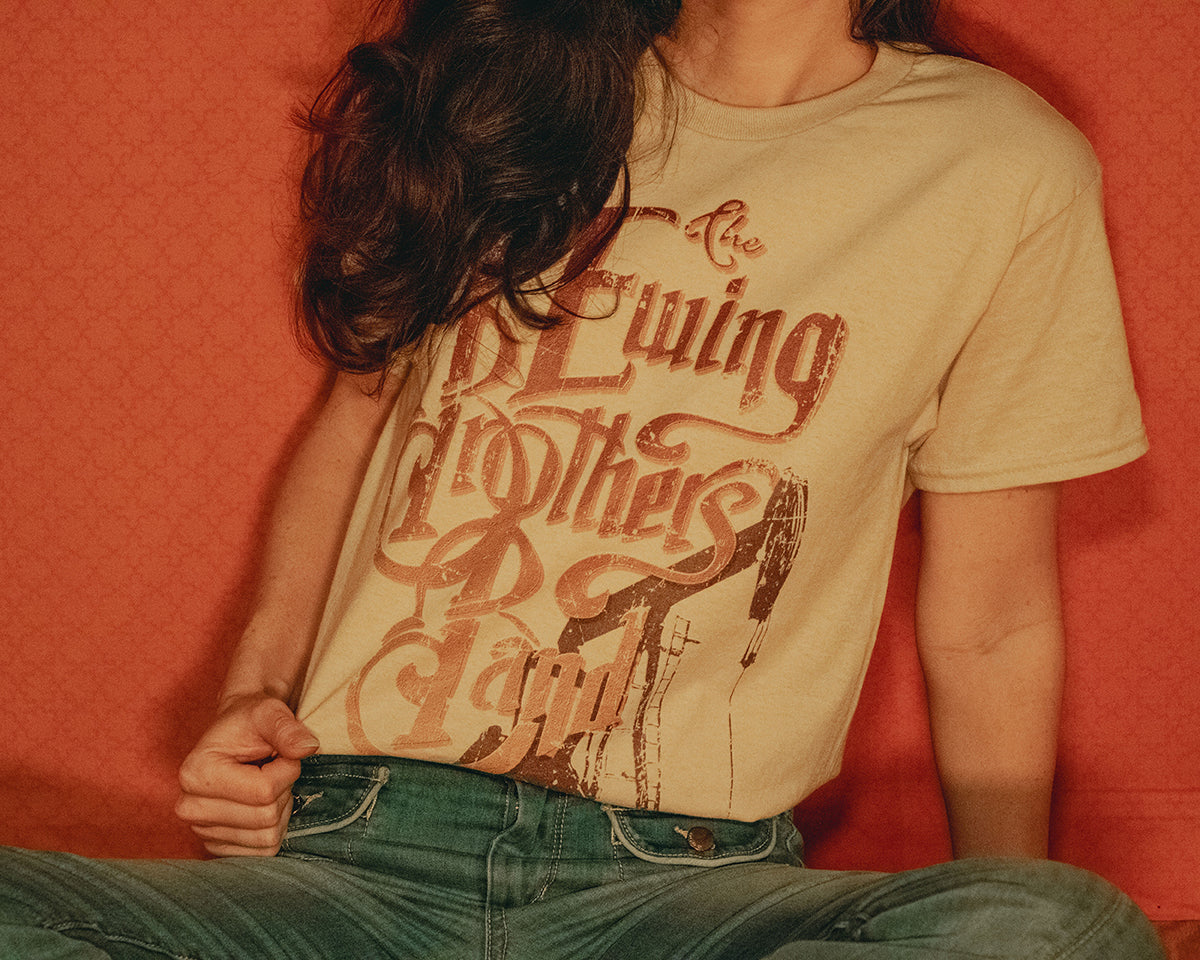 Woman Wearing T-Shirt of Dallas TV Series Ewing Brothers Band