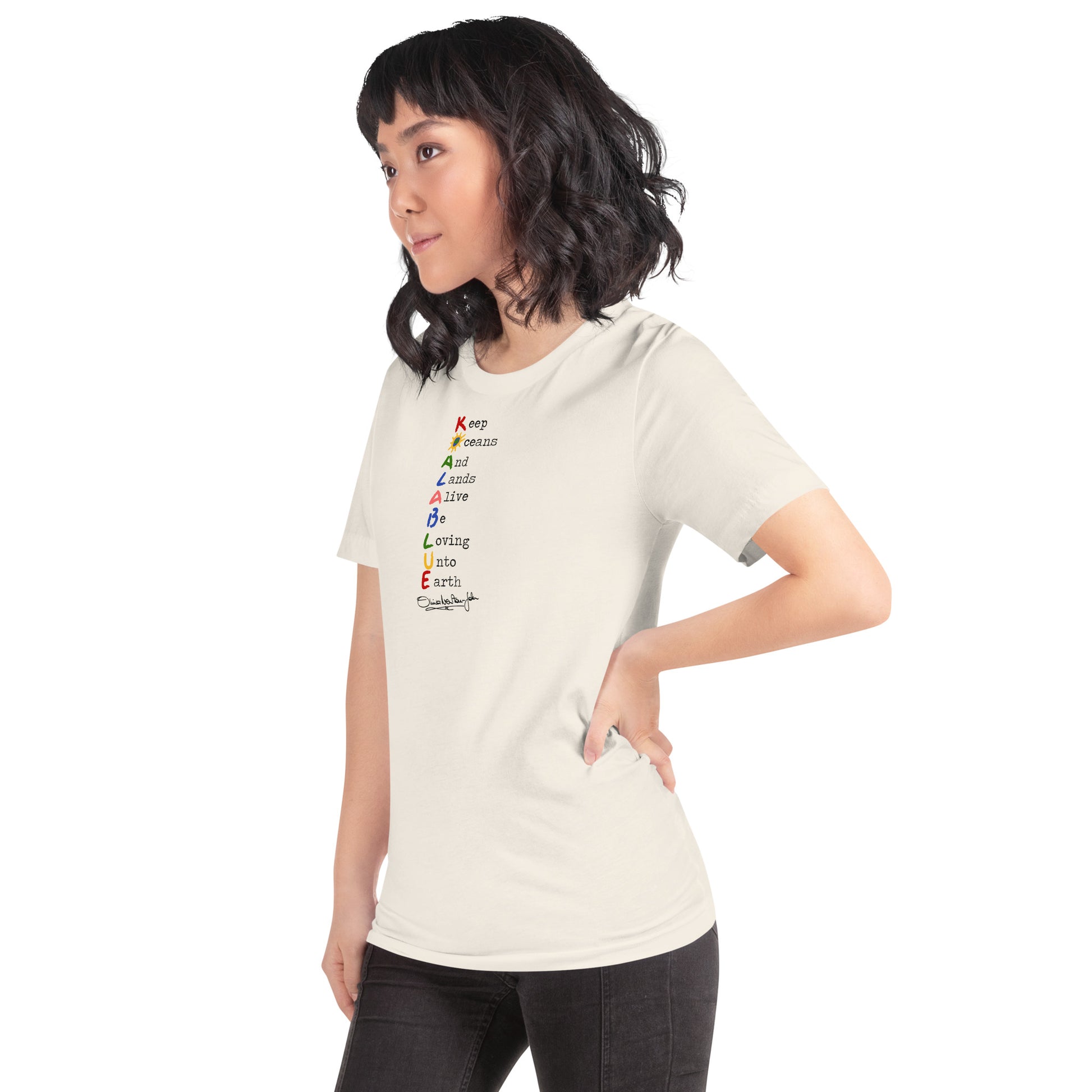 Woman Wearing Graphic T-Shirt with Koala Blue Mission Statement Inspired by Olivia Newton-John’s 1980’s Clothing Brand