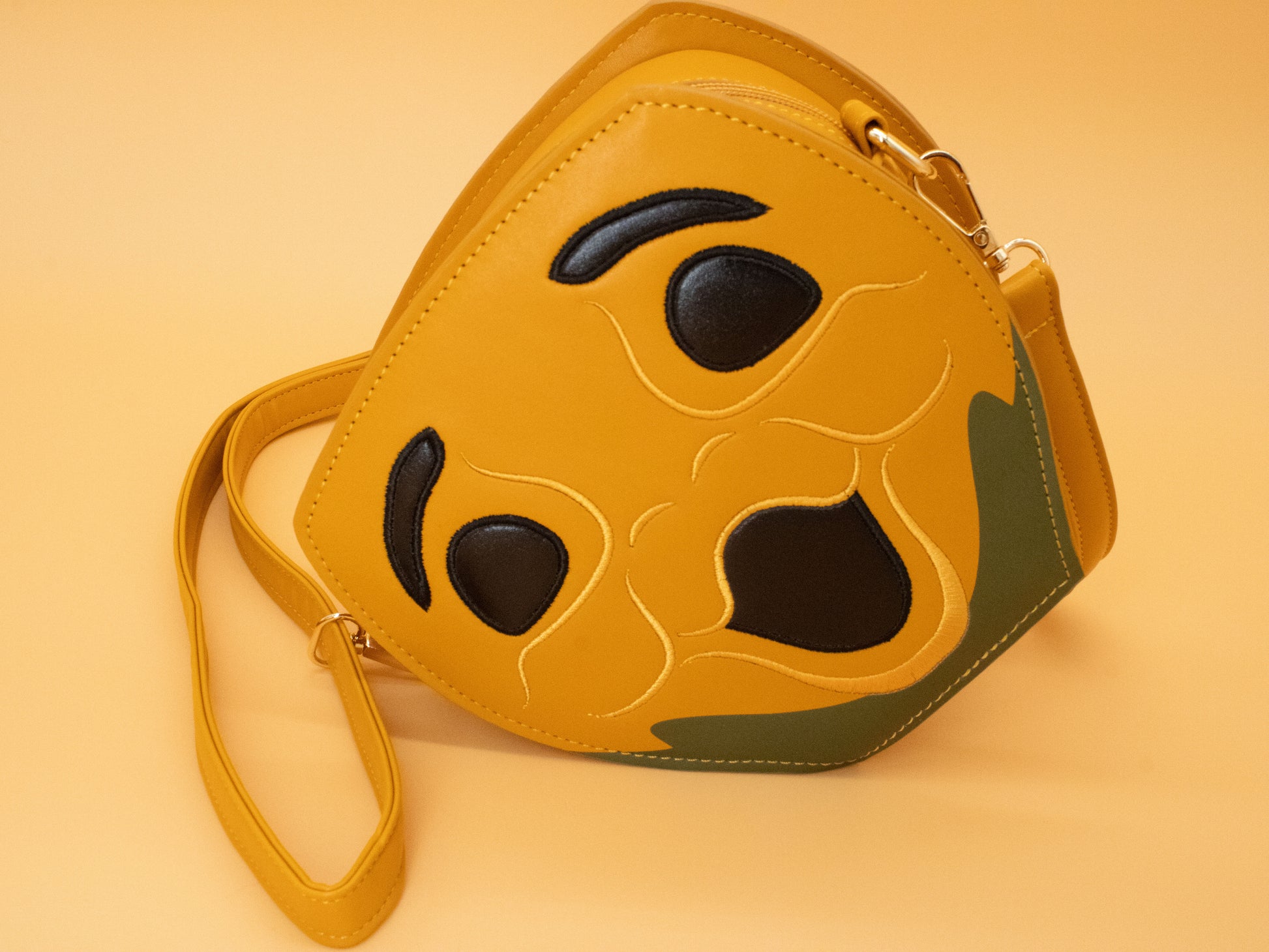 Novelty Purse in the Shape of a Pumpkin Inspired by Disney's Carousel of Progress on Orange Background