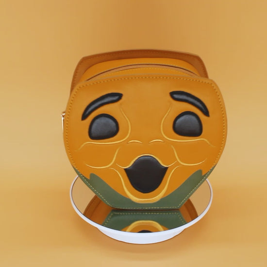 Video Showcasing Progress-Pumpkin-Purse rotating on orange background